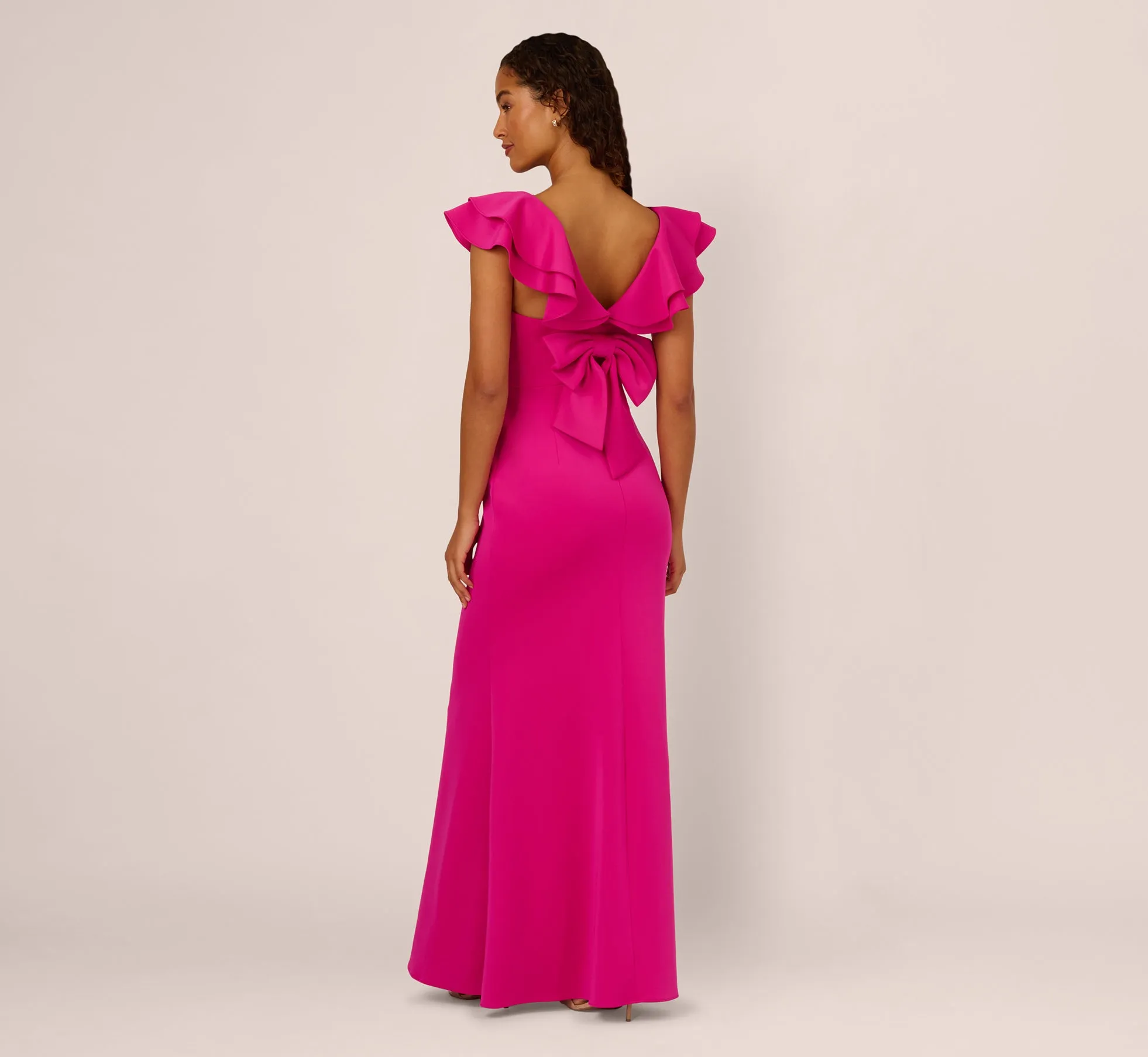 Flutter Sleeve Mermaid Gown In Fuchsia