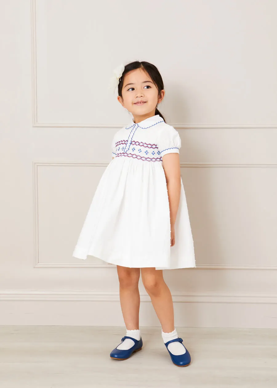 Hand Smocked Plumetti Short Sleeve Dress in White (12mths-6yrs)